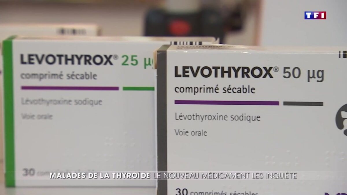Comprimés de Levothyrox et boîte de médicament posés sur une table, illustration des symptômes d'un mauvais dosage